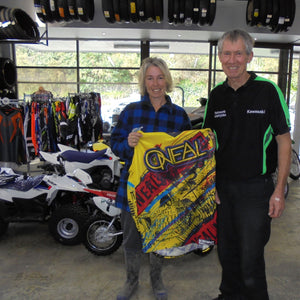 Garry, owner of Warkworth Motorcycles, with a happy customer.